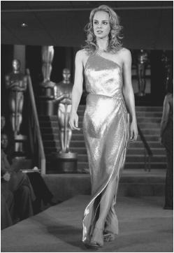 Anne Klein, 2001: matte gold pailette wrap gown, designed as an option for an Academy Award® nominee. © AP/Wide World Photos.